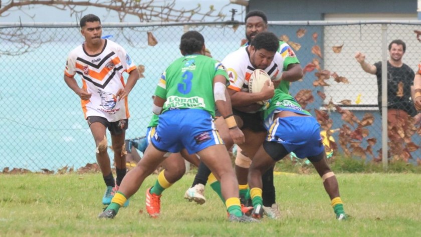 Mulga Tigers prop Jerry Ahmat hitting it up. Ahmat travels from New Mapoon on the mainland. Photo: Supplied