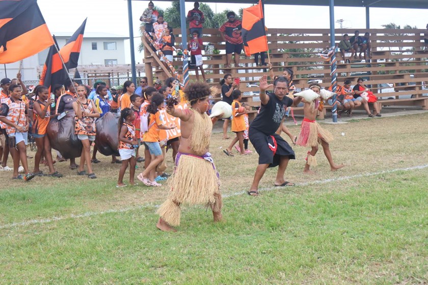 Dancers from Island Stars led the supporters and players on to the ground. Photo: Supplied