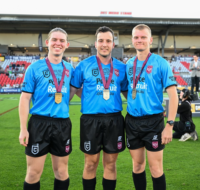 Dylan Lawrence (right) with the 2023 Colts grand final officiating team. Photo: Zain Mohammed/QRL
