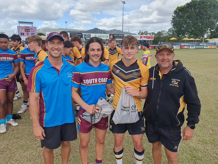 Team staff with South Coast's Bailey McConnell (centre left) next to Capricornia's Xavier Kerrisk.