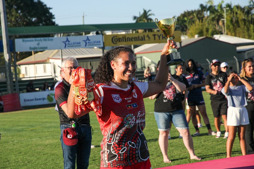 Currumbin skipper Teaghan Hartigan holds up the trophy. Photo: Jacob Grams/QRL