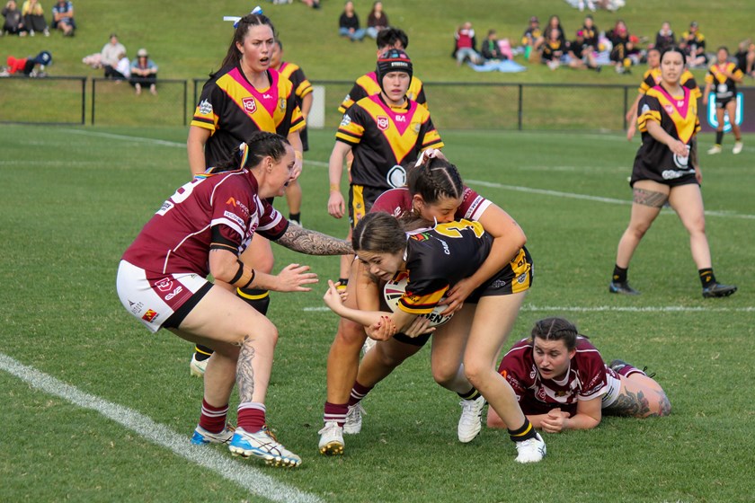 Remi Hinckesman puts on a strong tackle late in the game. Photo: Jacob Grams/QRL