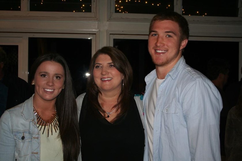 Kelly with his wife, Lauren, and mother, Maree.